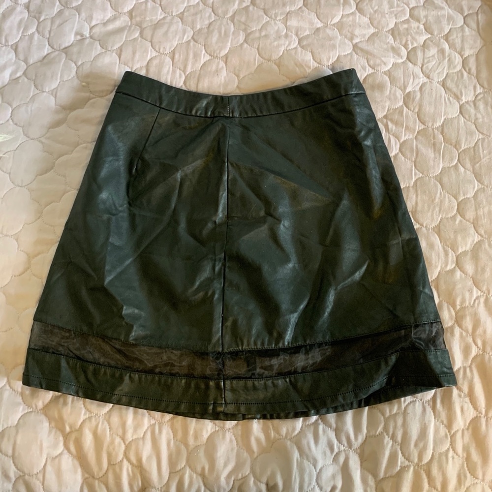 Black leather mini skirt